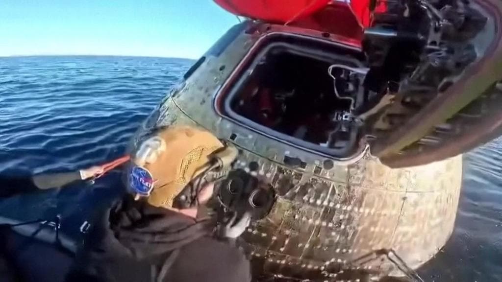 'Welcome home': Joyful reunion as Orion capsule opened after splashdown